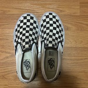 checkered black and white vans .